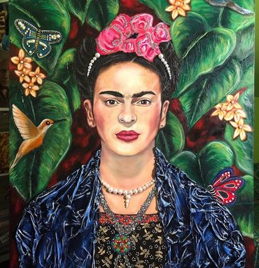 A vibrant portrait of Frida Kahlo with flowers, butterflies, and a hummingbird.