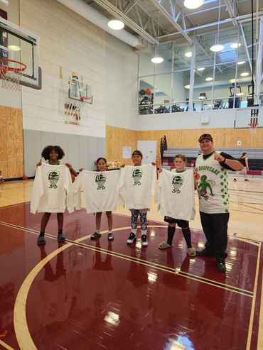 My basketball team Alien Hoopstarz went undefeated and took 1st place in the championship game. 
