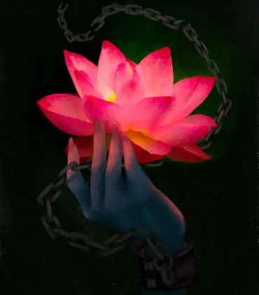 A hand in chains holding a glowing lotus flower.