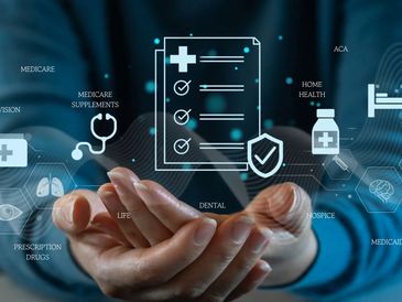 Medical object floating above someone's hands with healthcare and medicare words all throughout.