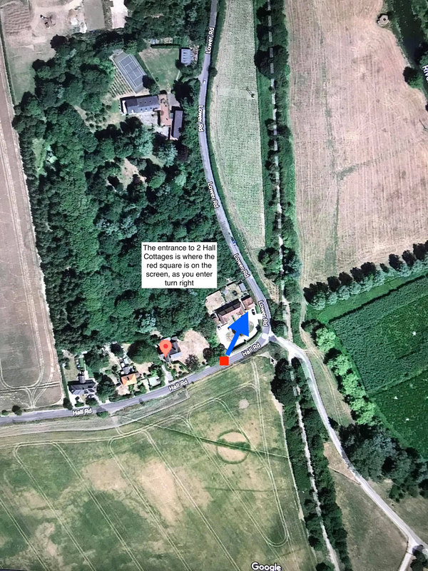 The drive way is just before or just after the bend- next to the village hall. 