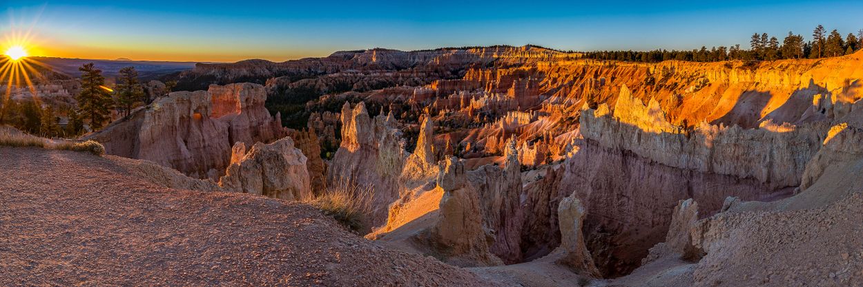 Sunset over Bryce Canyon's unique rock formations and colorful landscape.