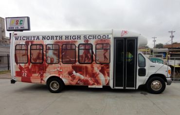 School bus with Wichita North High School graphics.