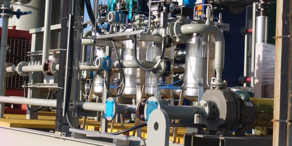 Industrial water treatment equipment. Pumps, filters, and pipes.