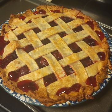 Homemade cherry pie with lattice crust.