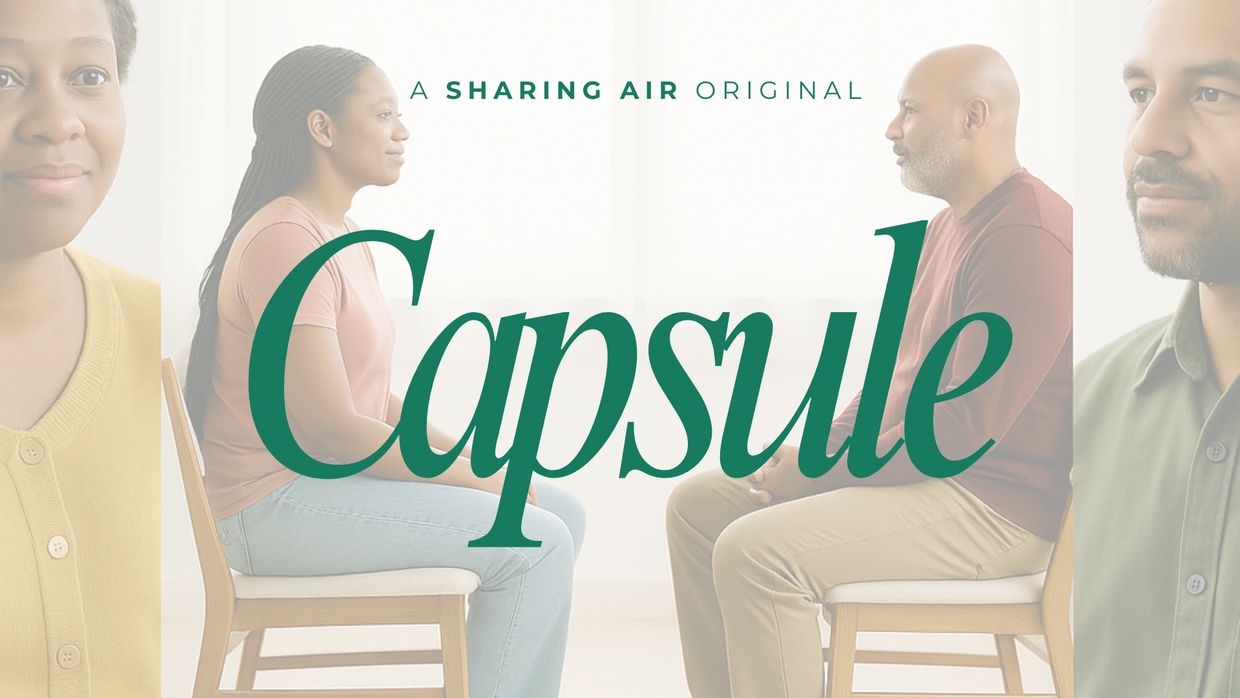 Two people sitting face-to-face in CAPSULE by Sharing Air, a guided conversation across Connect, Discover, Reflect, Heal.