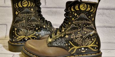 Custom-painted mushrooms on Dr. Martens boots.