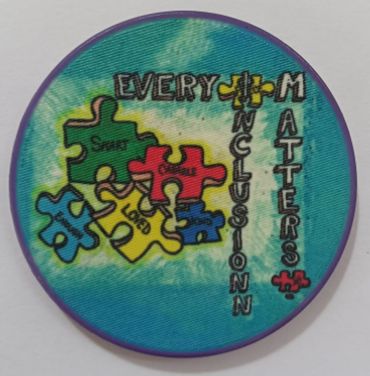 Poker chip for autism awareness. 