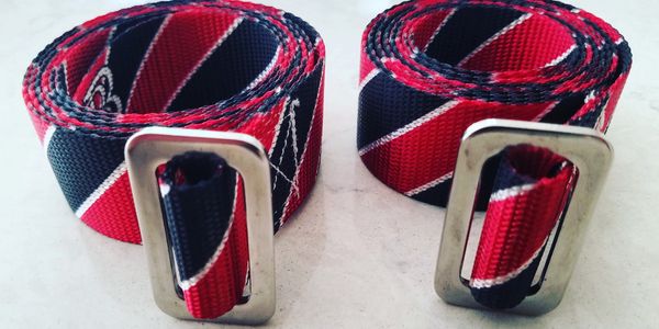 2 bowtie belts with stainless steel slides in university of georgia colors