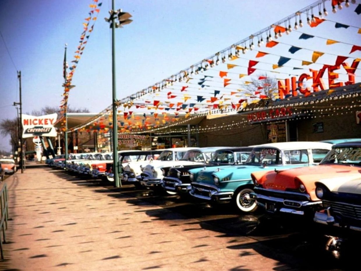 Vintage Chevrolet cars lined up at Nickey Chevrolet dealership.