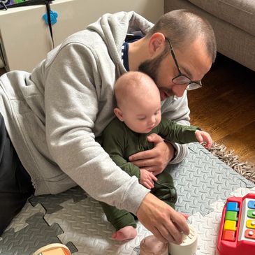 Brendan with his daughter spending time with her as a primary caregiver.