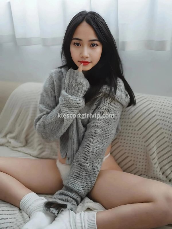Joan - Stunning Mongolian Escort at klescortgirlvip.com, celebrated for her enchanting beauty.