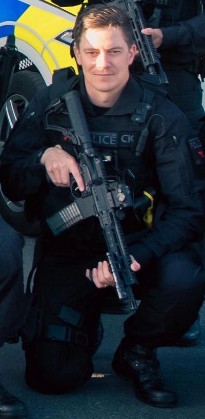 Barry as an Armed Police Officer 