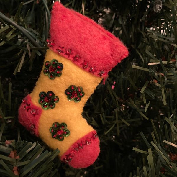 closeup shot of Christmas socks on the tree 