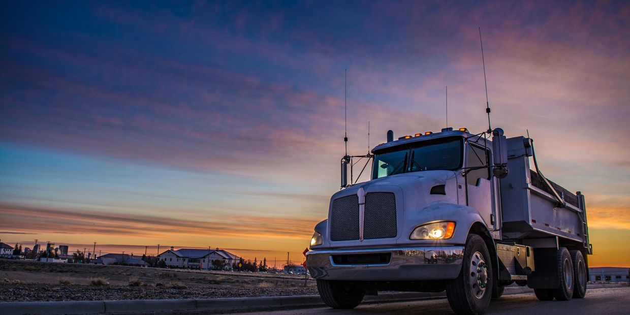 Dump truck at sunrise