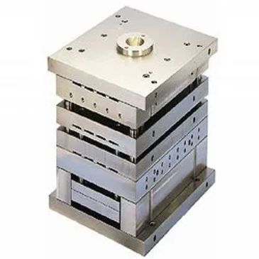 A multi-layered metal mold used for industrial manufacturing.