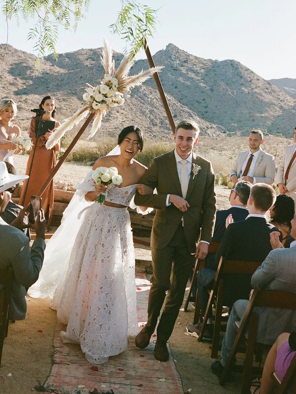 Large ceremony arrangement using white fresh and dried florals created by Dianna