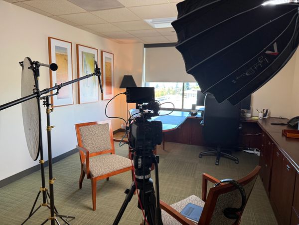 Professional video setup in a small office for an interview or recording.