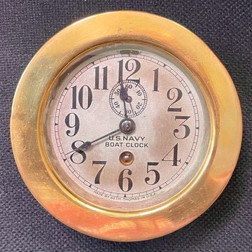 Circa 1930 antique Seth Thomas "Boat Clock" for the U.S. Navy.  The clock is powered by a high quali