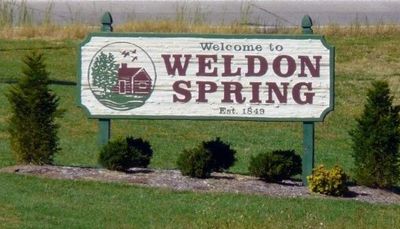A sign welcoming you to Weldon Spring, MO