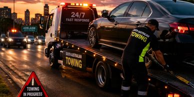South Australian towing assisting a stranded vehicle with a tow truck on the roadside in Adelaide.