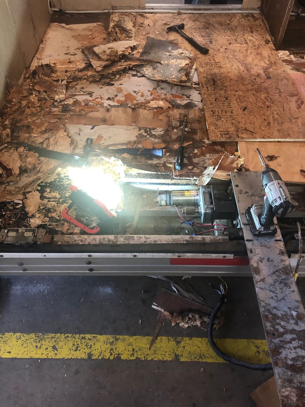 floor repairs being made on a horse trailer with living quarters 