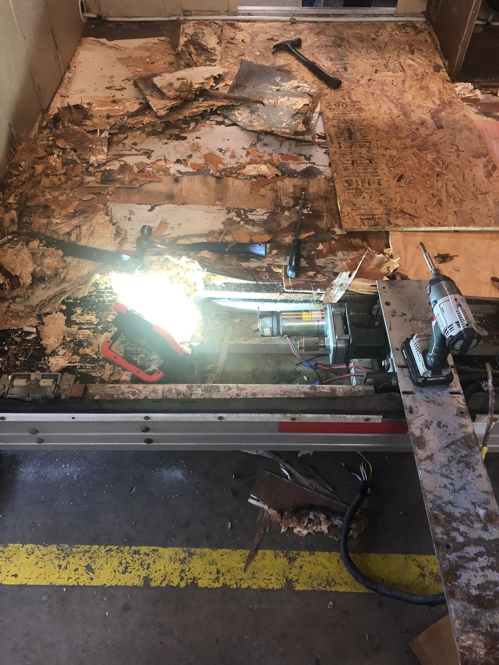 floor repairs being made on a horse trailer with living quarters 