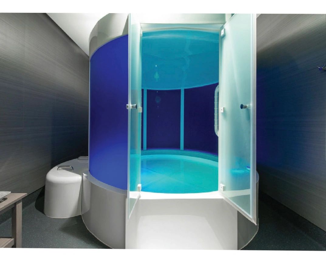 Clean, professional medical spa treatment room with neutral tones at FLOAT49 in Anchorage