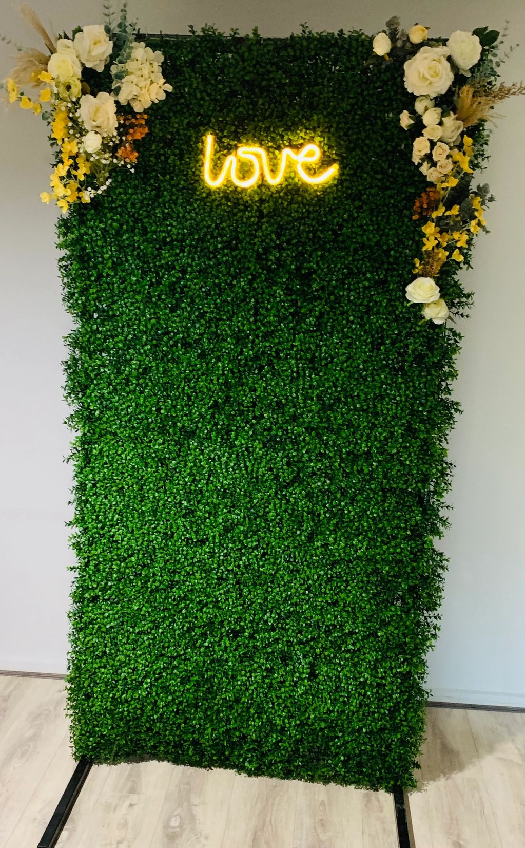 Lush Greenery Backdrop. 
Approx 2m high x 1m wide. 

Range of faux florals available. (price not inc