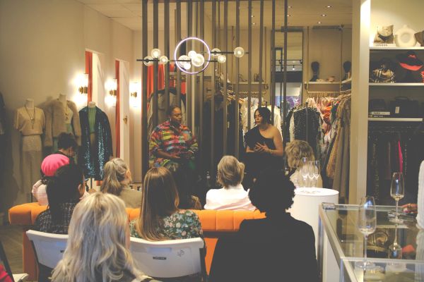 Group discussion in a fashion store.