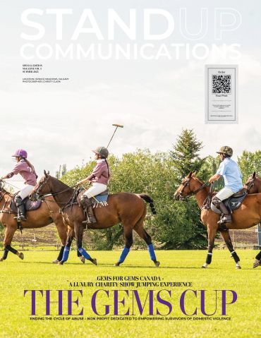 Polo players riding horses in a charity event.