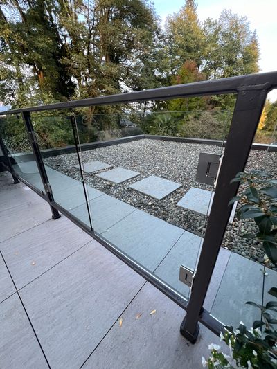 Newly installed glass panels on a Shaugnessy rooftop 