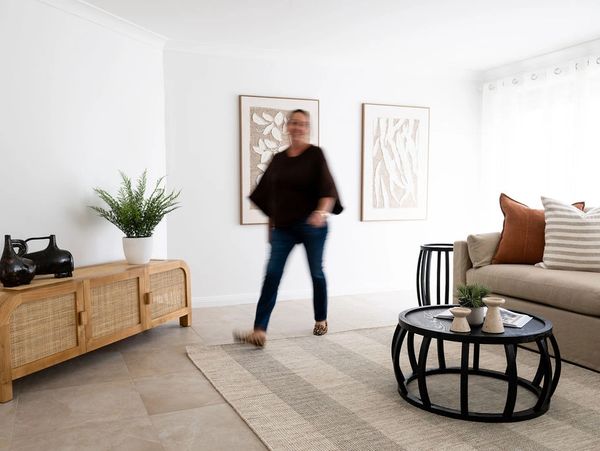 Bright and cozy living room with modern decor and natural tones.