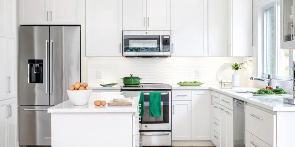 A nice bright kitchen with cabinets freshly painted white