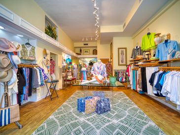 Marley's Palm Beach Collection store interior with colorful clothing and accessories.