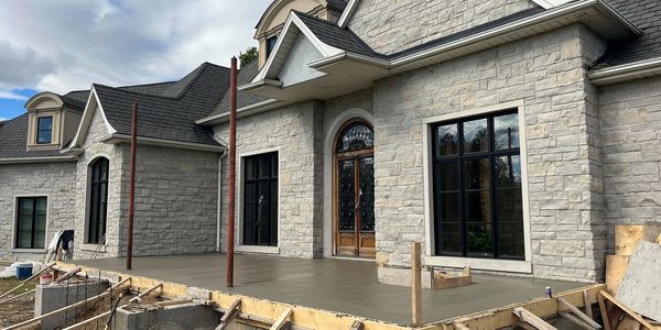 Concrete front porch for home in Jordan, Ontario.