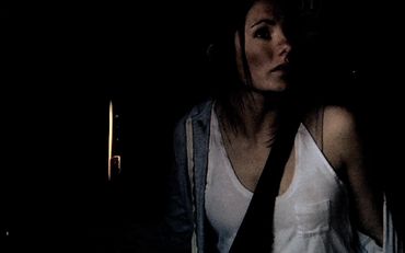 Savanna Bluff as the terrified forager pursued by zombies in "Web Series Trailer" by David R. Dufour