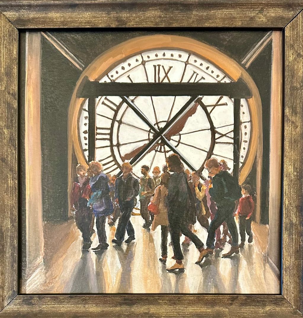Group of people moving in front of a large clock face and window.