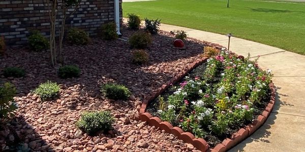 We offer custom designed flower beds and lighting installation. 