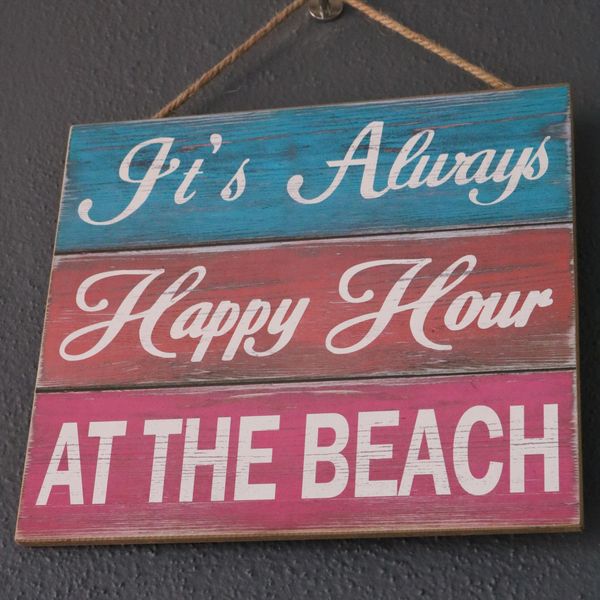 A sign that reads, It's Always Happy House At the Beach