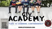 Children sitting on a bench, reading books, promoting GTV Academy.