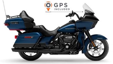Blue touring motorcycle with GPS included, designed for long rides.