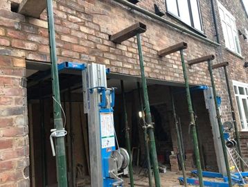 Structural steel opening. Propped up by acros 