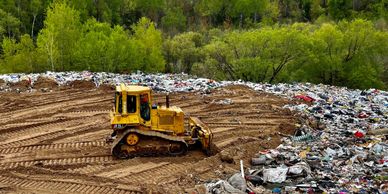 Landfill operations and management. Daily cover with soil of waste. 