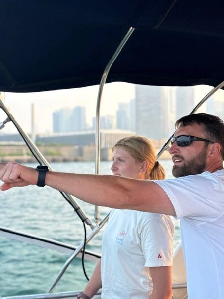 Boat Safe Chicago's Captain Joseph and crew Klaudia keeping watch in the Playpen/photo courtesy of Klaudia Z. joseph crulchich boater safety boat safe