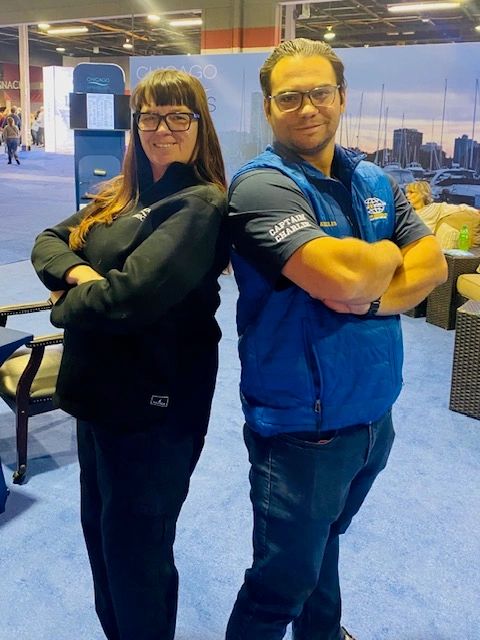 Master Captain Deborah and Master Captain Charlie at the Chicago Boat Show/photo courtesy of Boat Safe Chicago Deborah Nalian charlie Koules boat safe chicago master captains boat instructors boat safe chicago boater safety