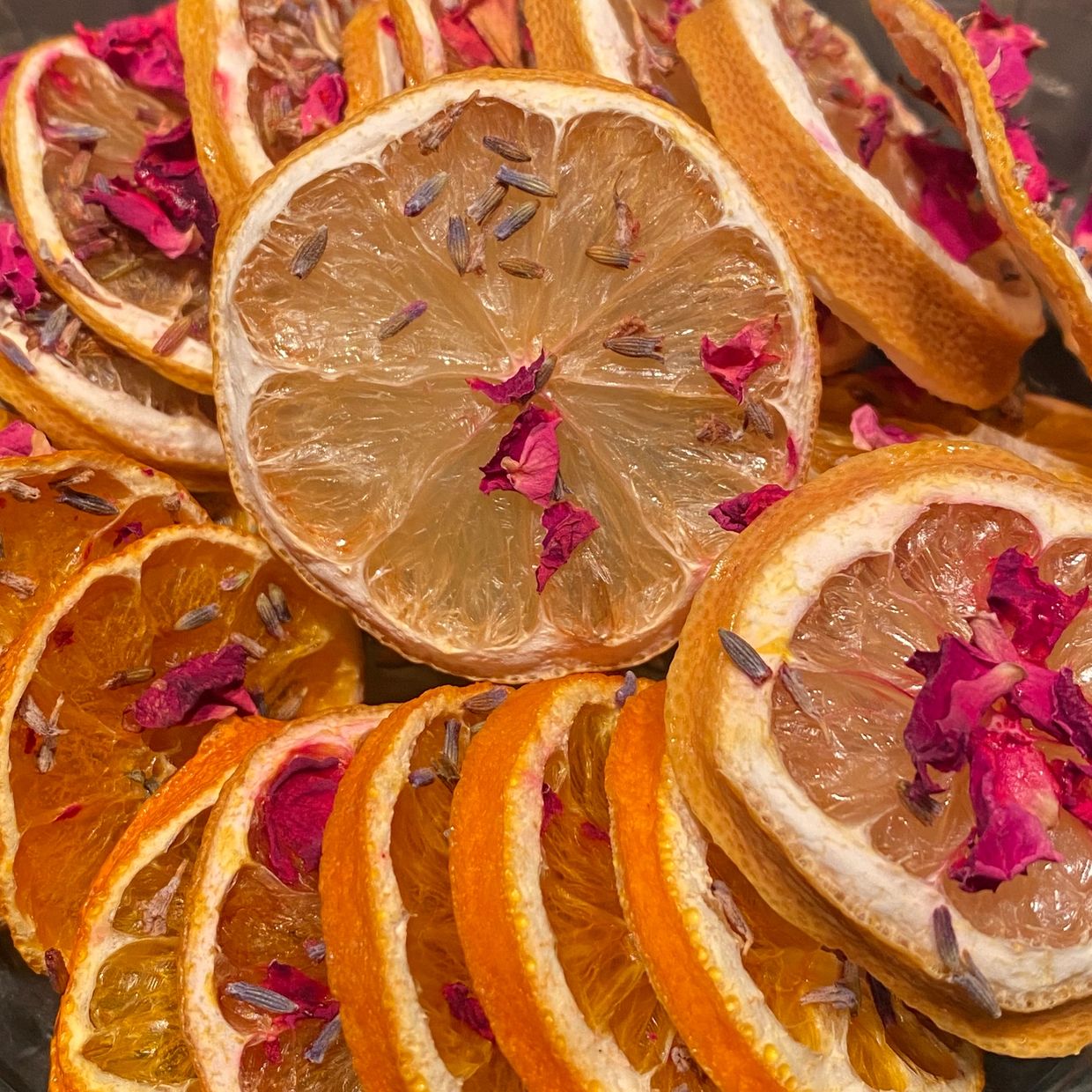 Oranges dehydrated for 6 to 12 hours with lavender and rose petals.