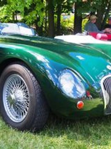 A green car standing on the ground