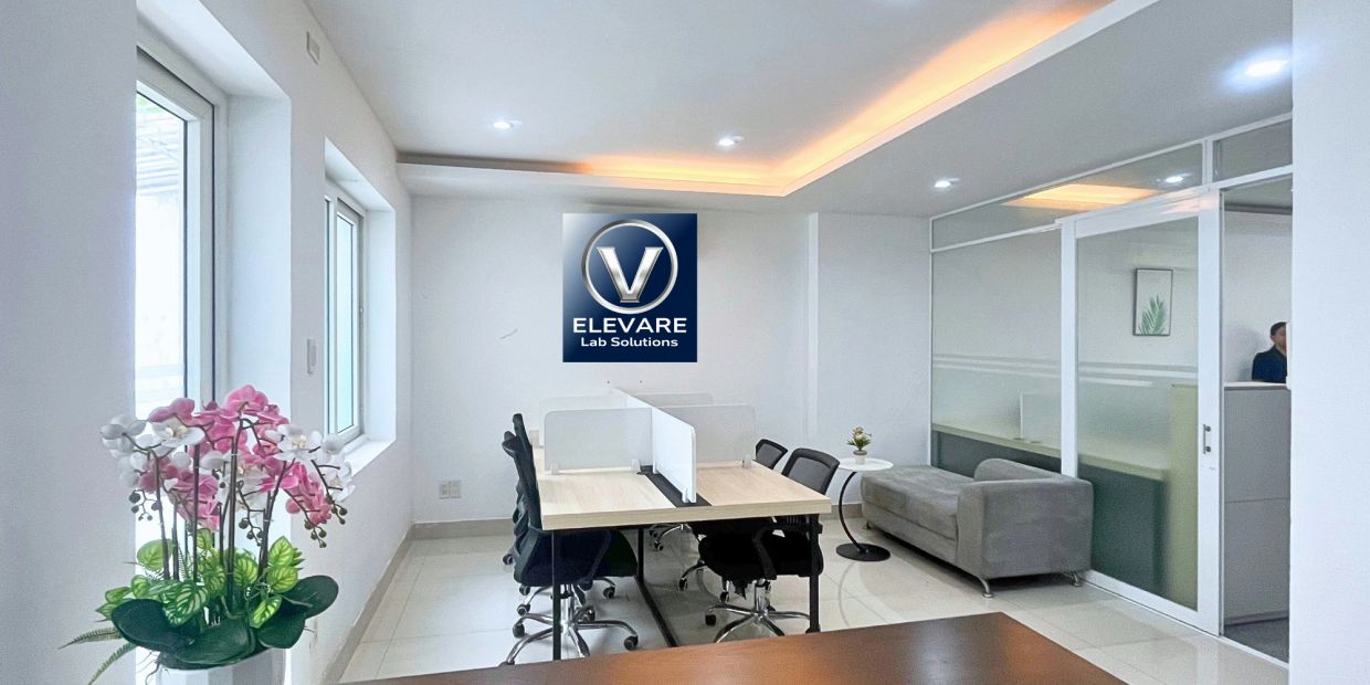 Modern office space with desks and chairs.