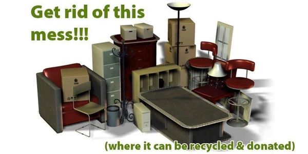 A cluttered pile of furniture and boxes with a message to recycle or donate.